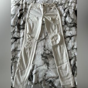 White skinny rockstar jeans distressed size 2